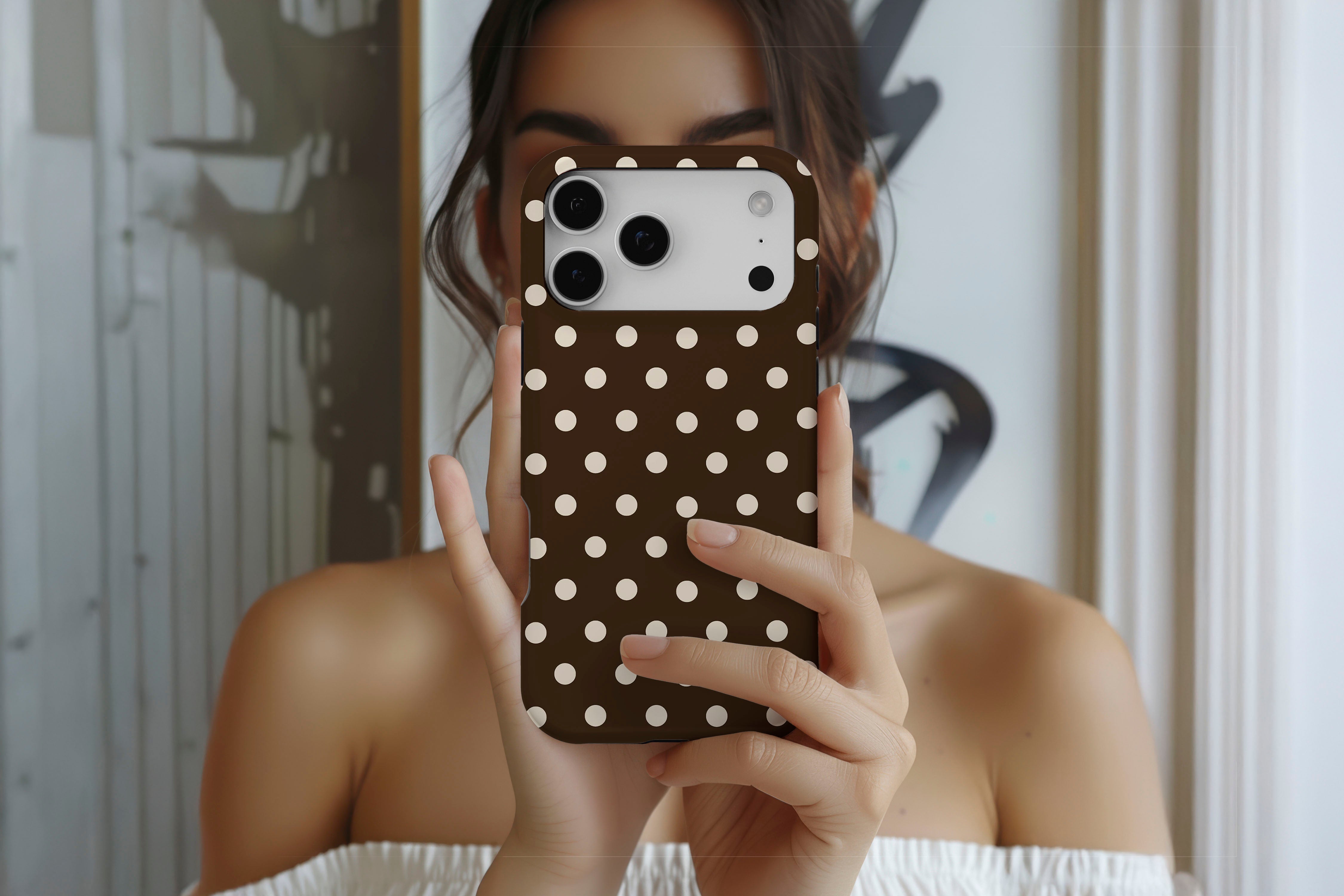 Lifestyle image of Chocolate Spot magnetic tough case showing spotty design