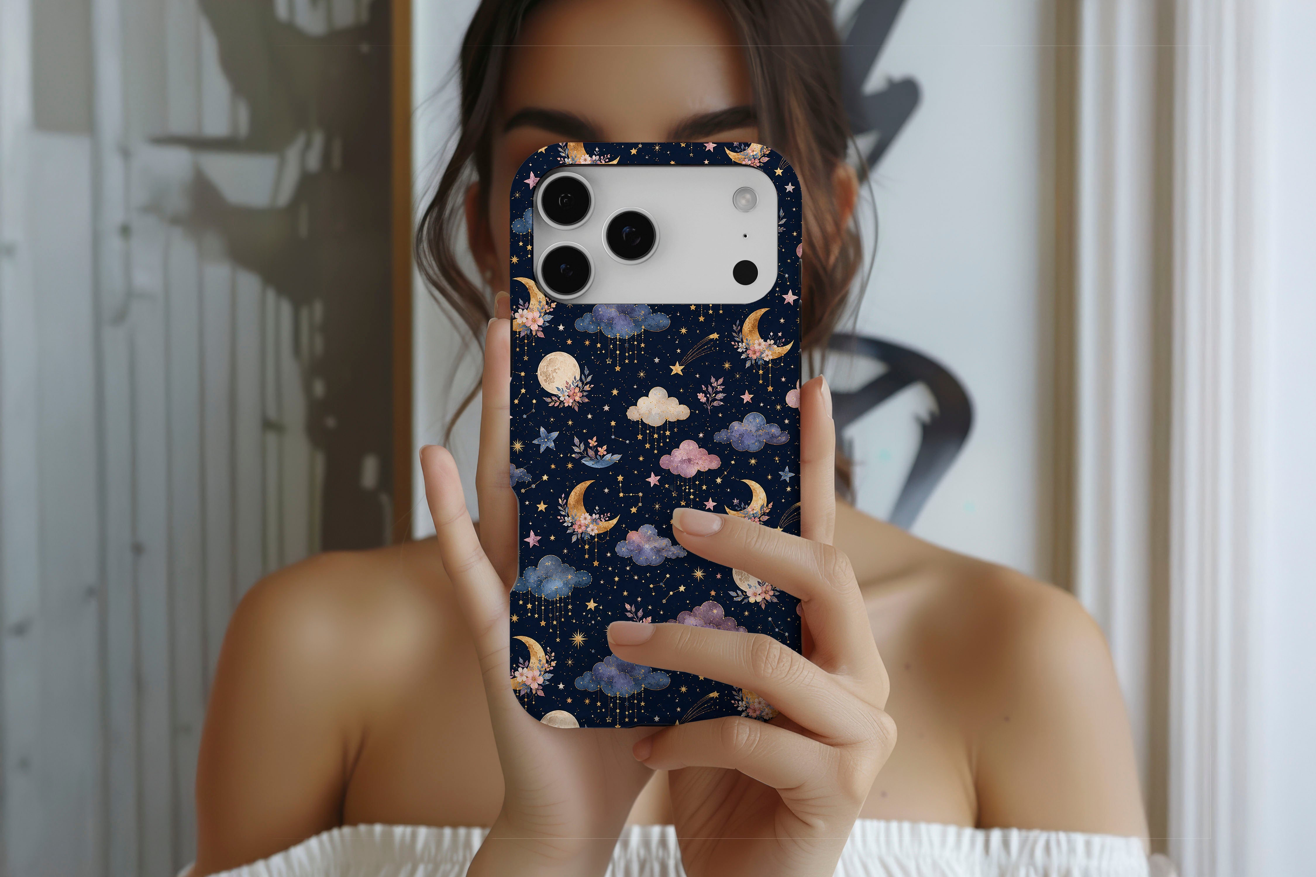 Lifestyle image of Dreamscape magnetic tough case showing celestial print design