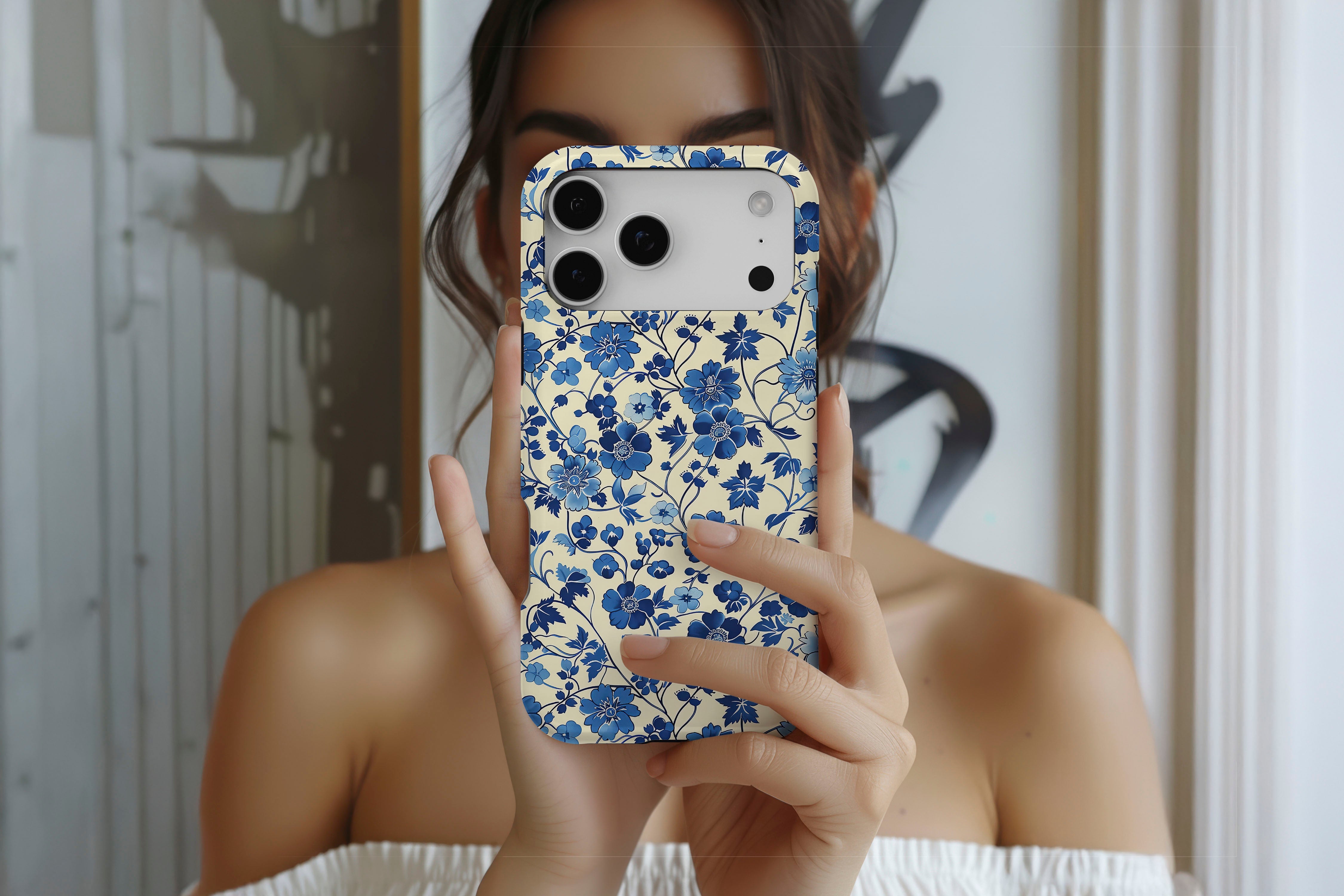 Lifestyle image of Floral Blues magnetic tough case showing blue floral design