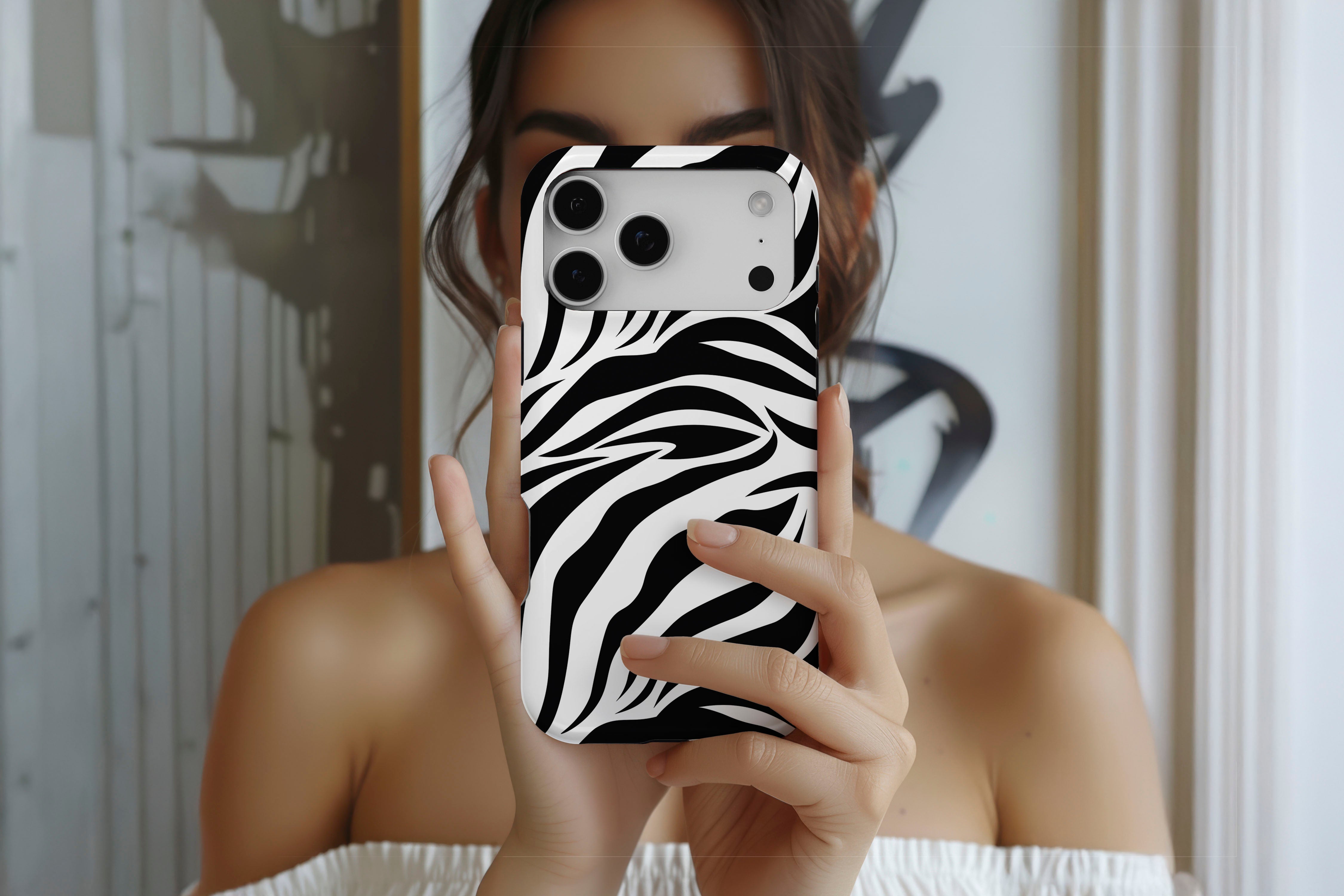 Lifestyle image of Mono Zebra magnetic tough case showing animal print design