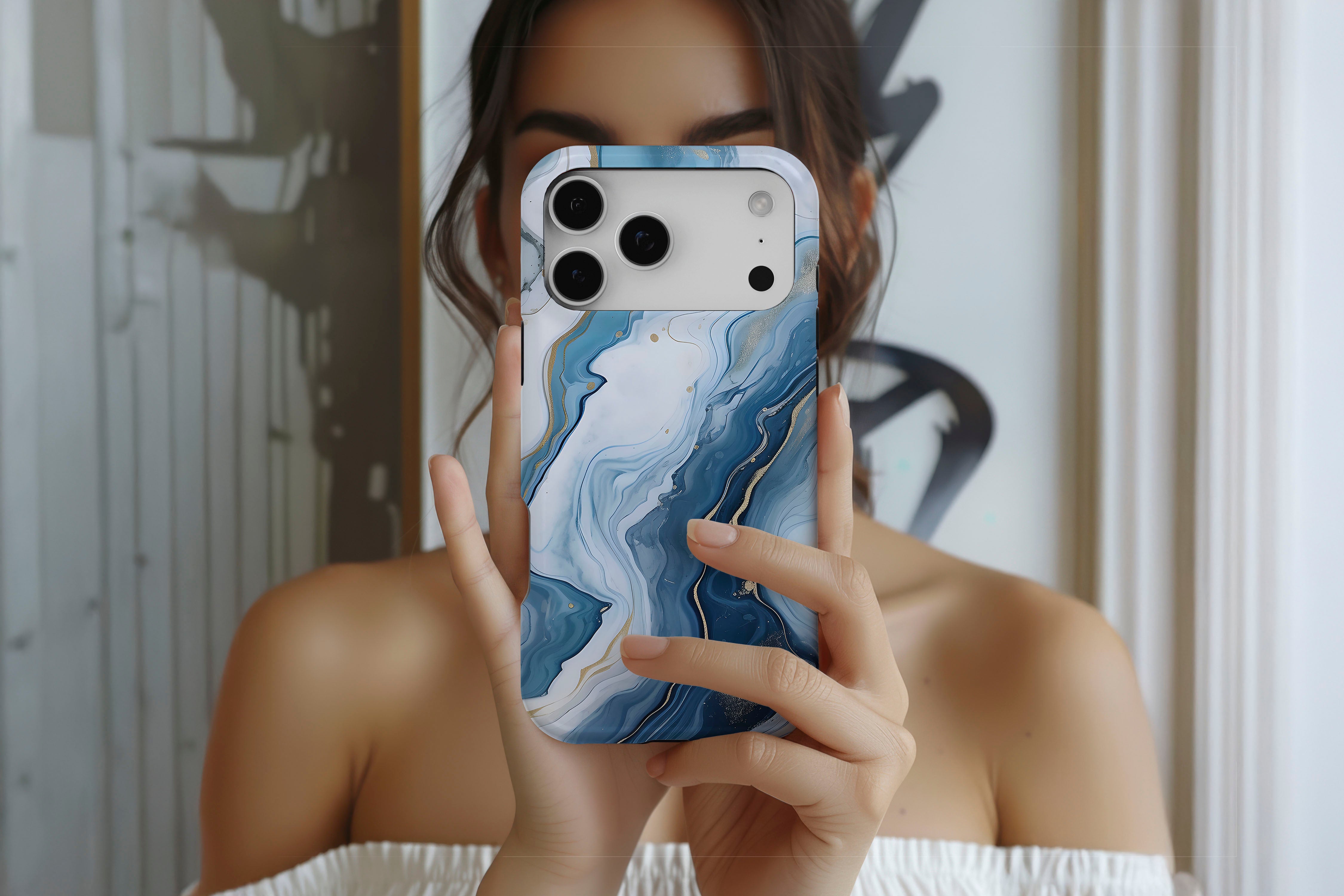 Lifestyle image of Opulent Blue magnetic tough case showing marble print design