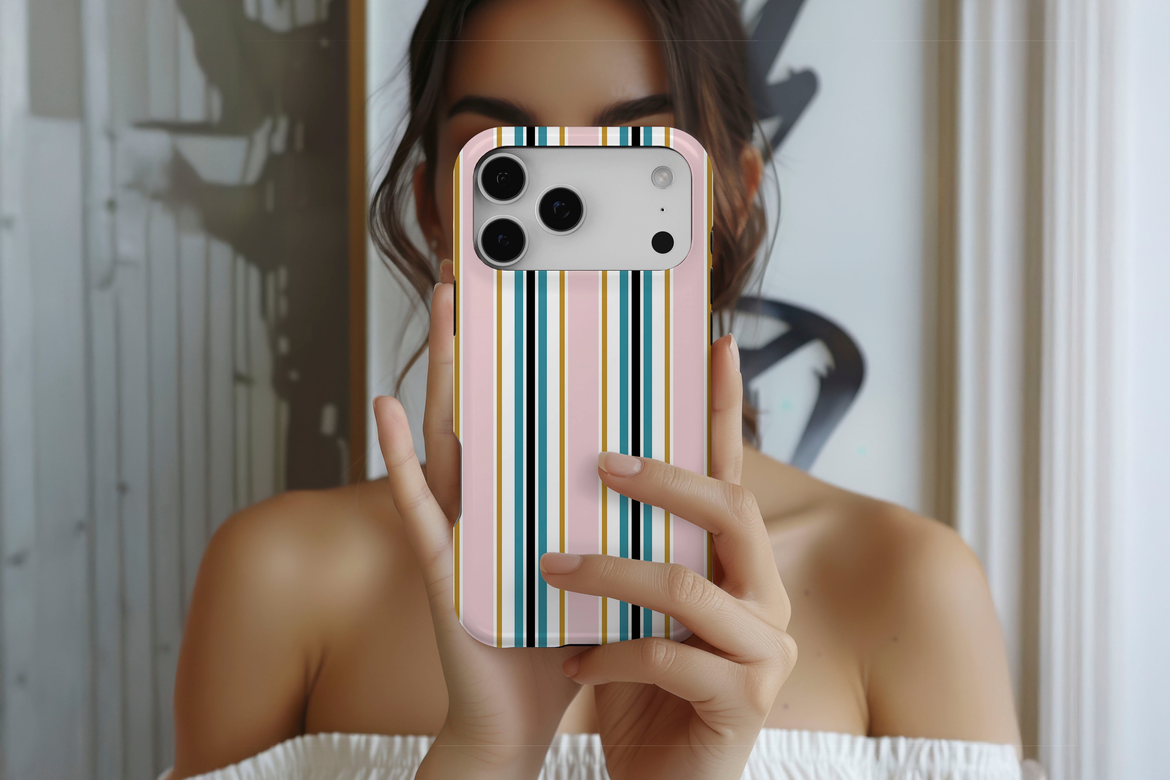 Lifestyle image of Palm Springs magnetic tough case showing multi stripe print design