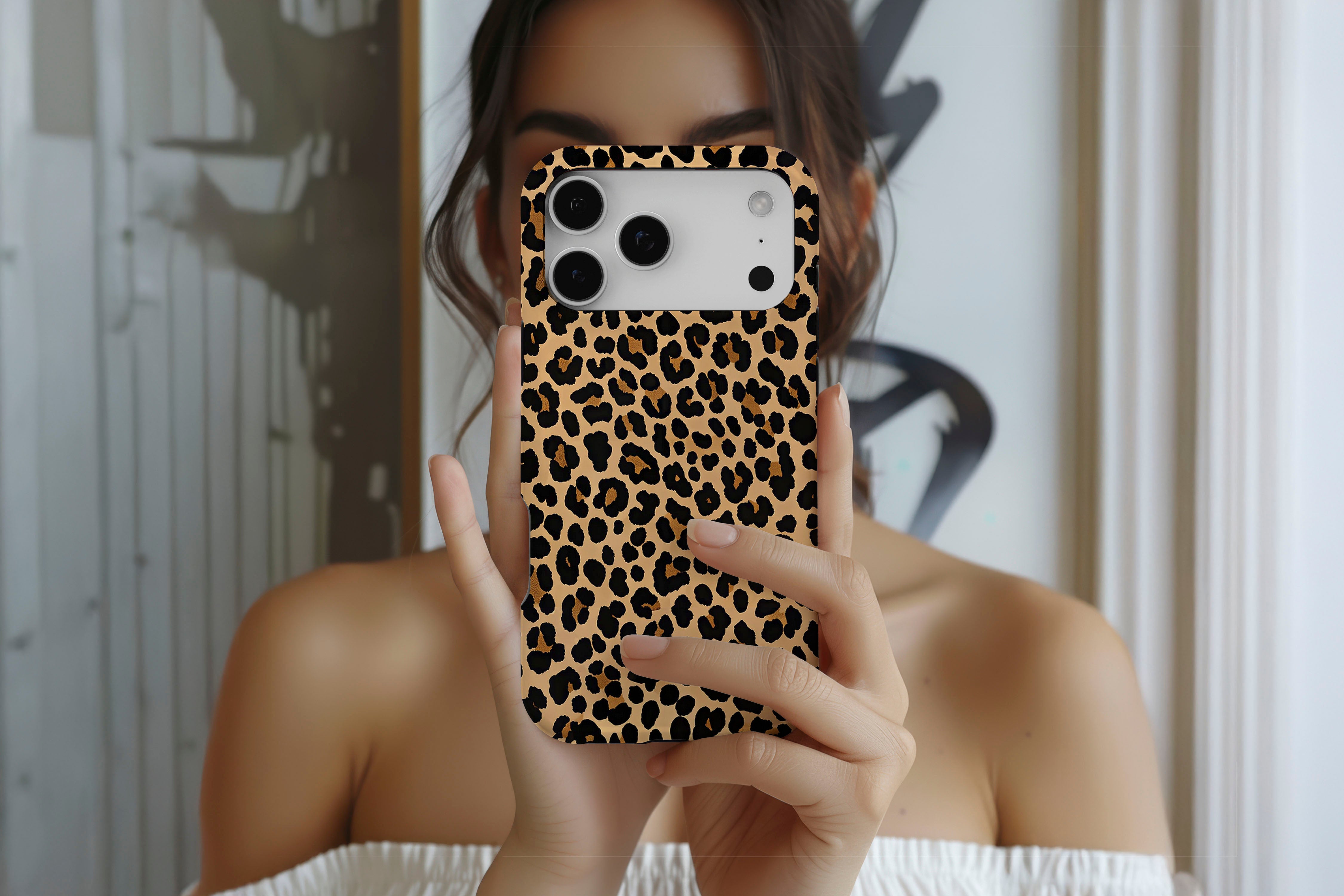 Lifestyle image of Wild Side magnetic tough case showing leopard print design
