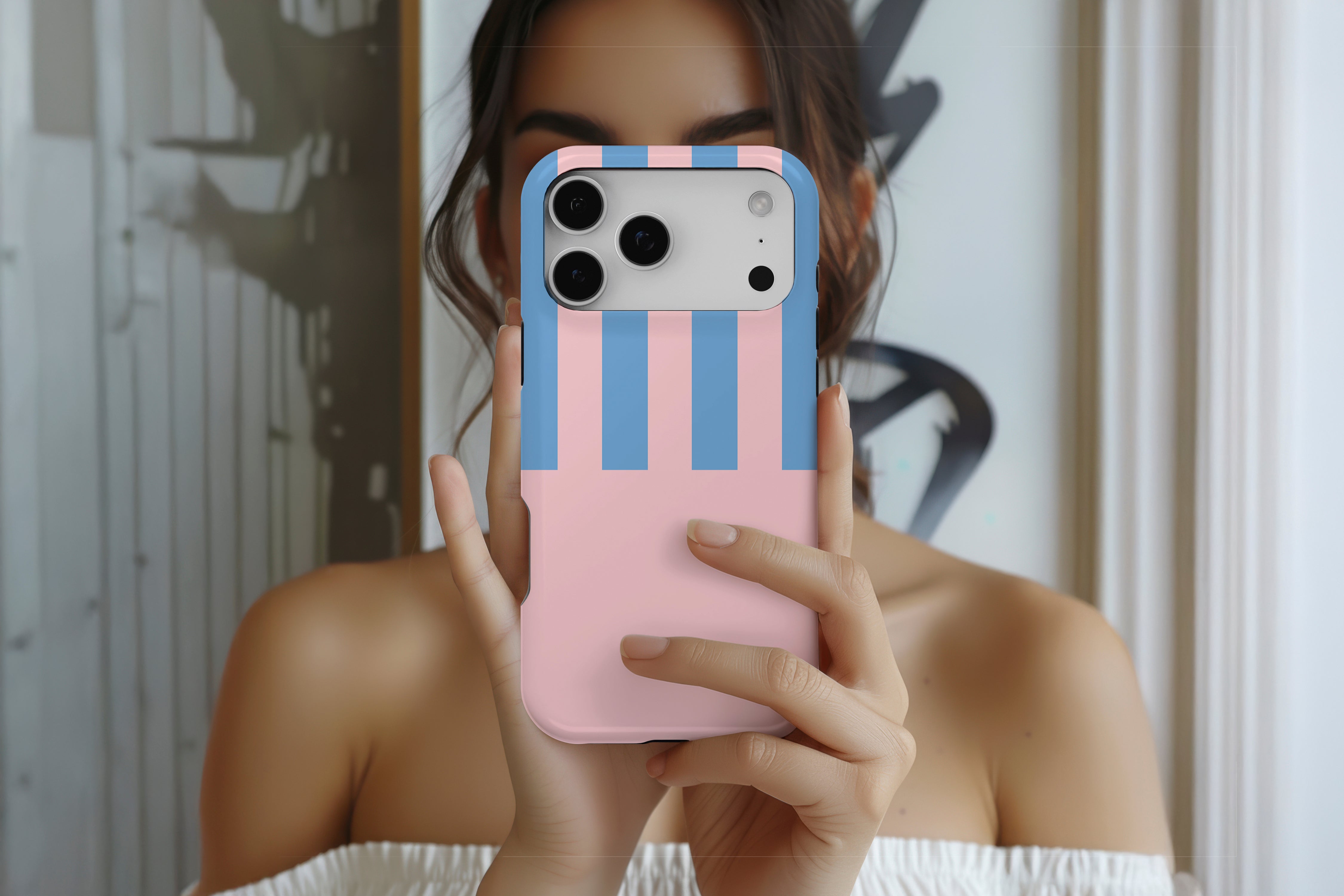 Lifestyle image of Miami Stripe Pink and Blue magnetic tough case showing stripy design 