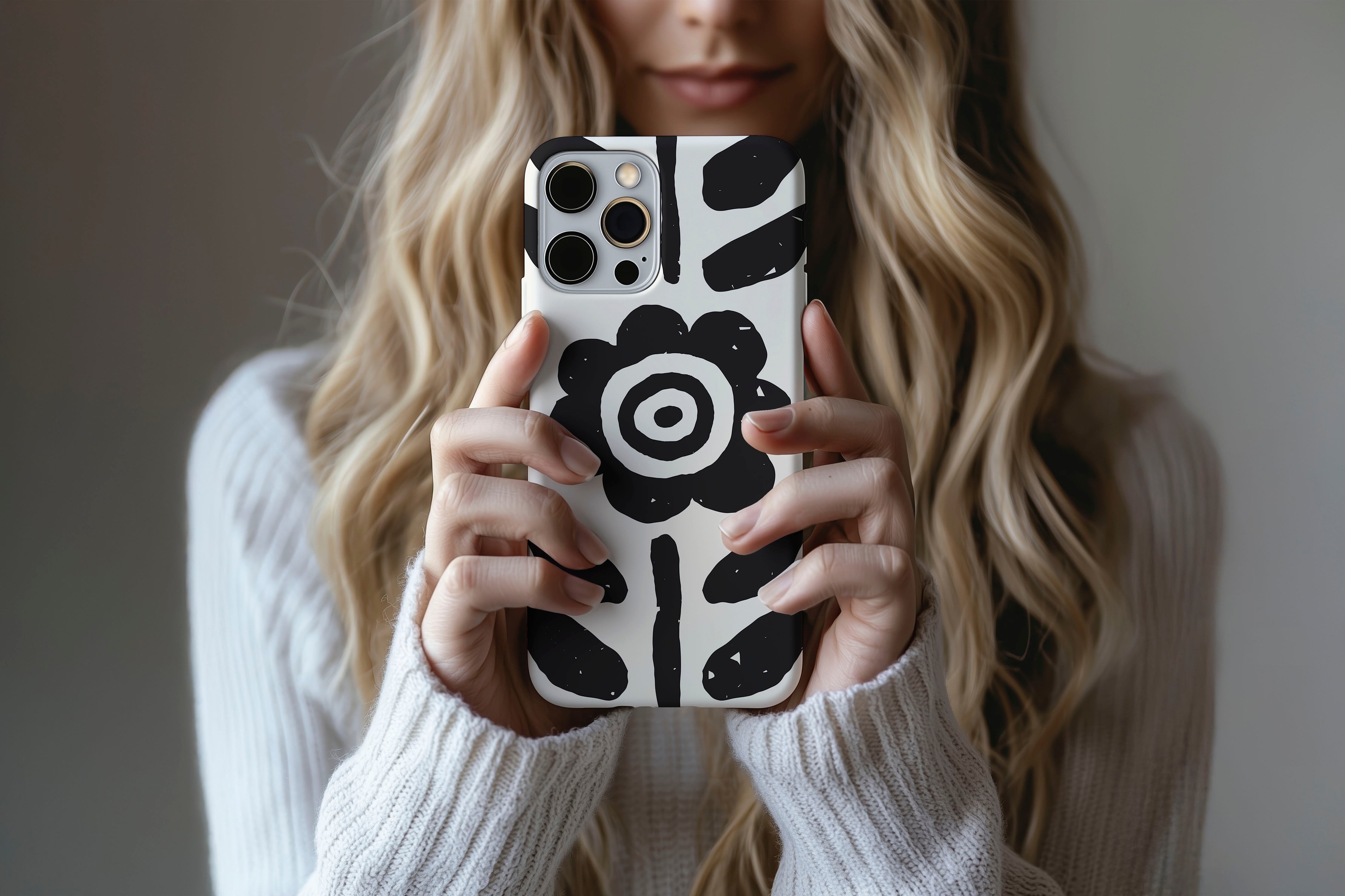 Lifestyle image of Abstract Flower phone case showing mono flower design 