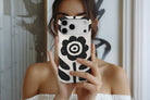 Lifestyle image of Abstract Flower magnetic tough case showing stripes design
