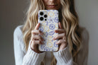 Lifestyle image of Amalfi Lemon phone case showing lemon print design