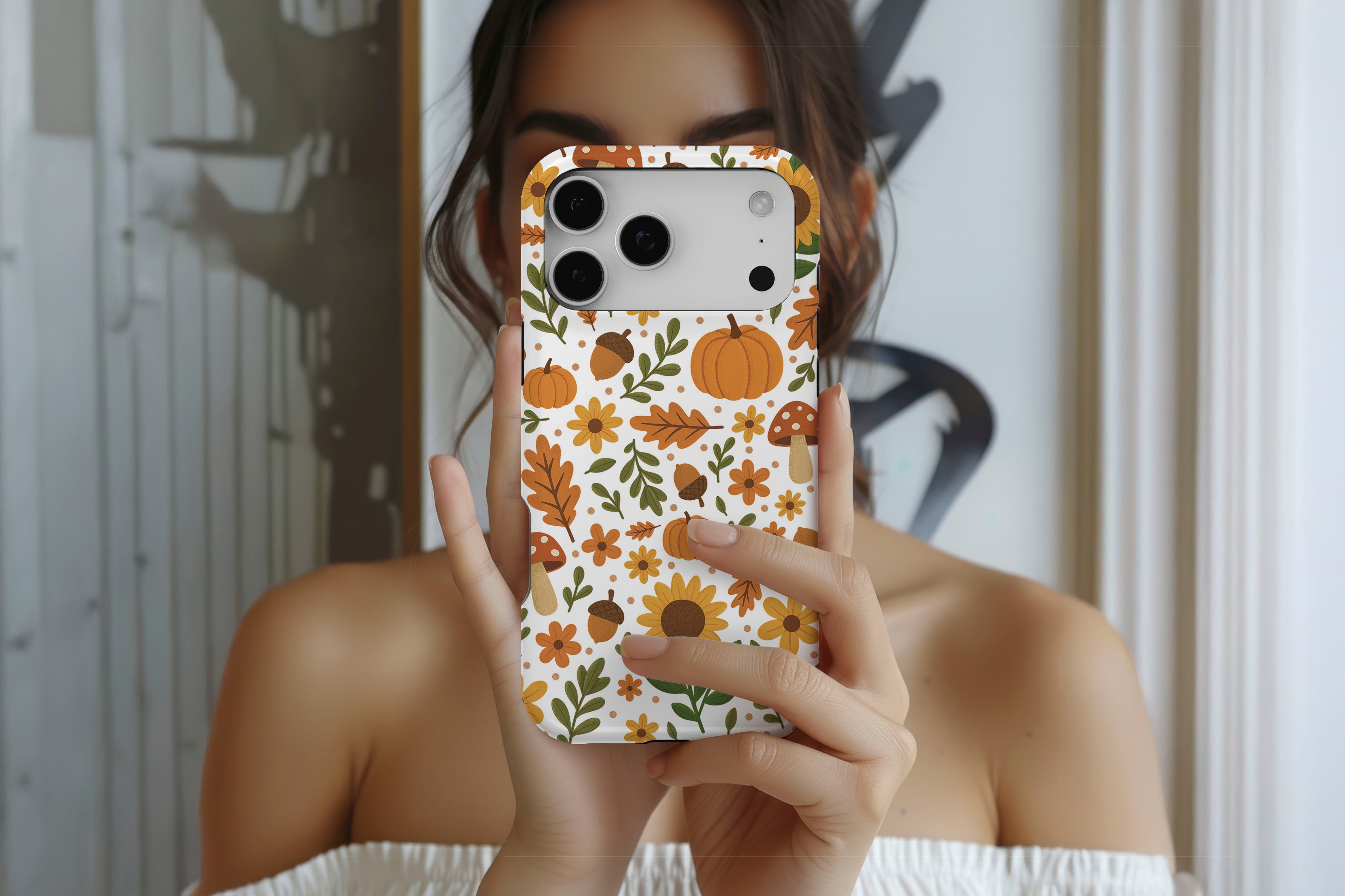 Lifestyle image of Autumn Meadow magnetic tough case showing autumn floral print design
