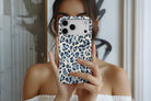 Lifestyle image of Blue Leopard magnetic tough case showing animal print design 