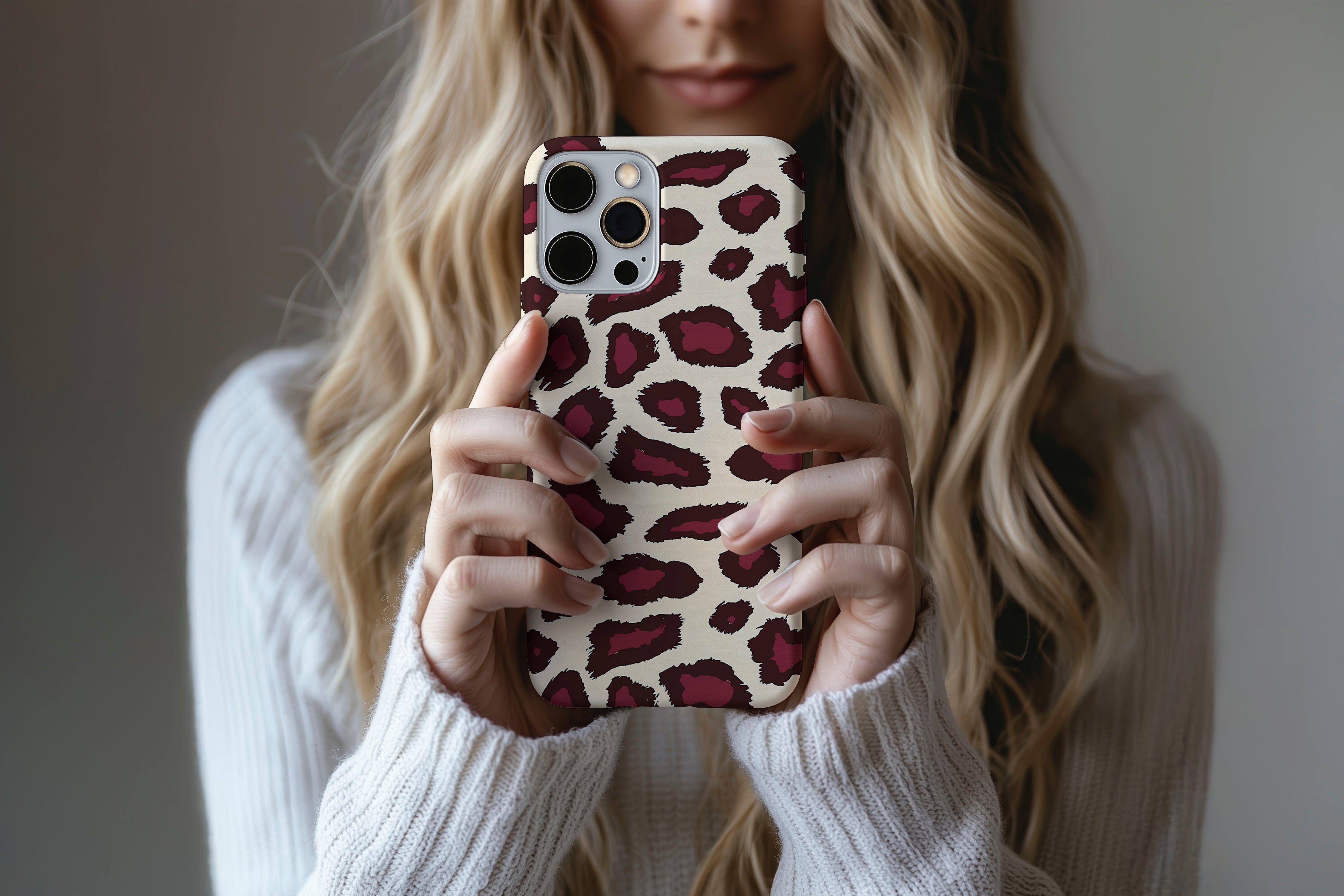 Lifestyle image of Burgundy Leopard  phone case showing leopard print design 