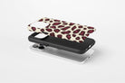 Side view of Burgundy Leopard case showing  an example of tough case