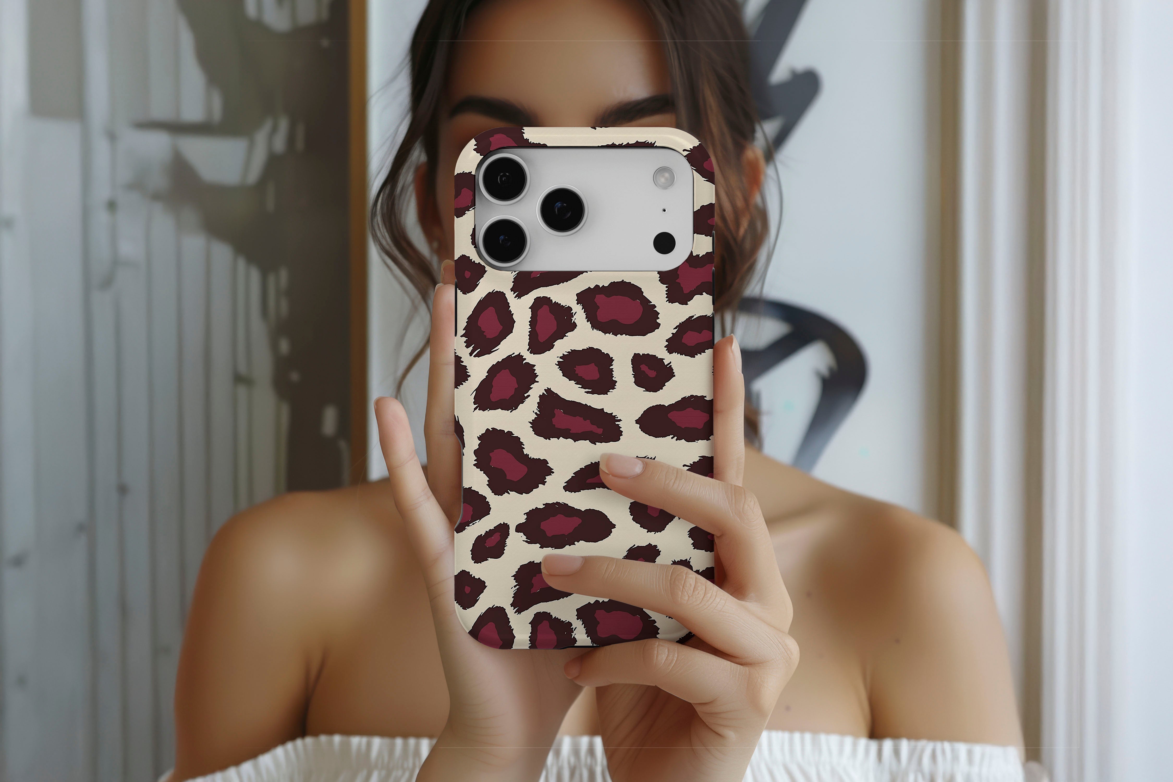 Lifestyle image of Burgundy Leopard magnetic tough case showing burgundy print design