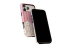 Side view of Cabana Bloom phone case showing button cut-outs