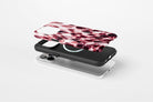 Side view of Confetti (Berry) phone case showing berry, blush pink and cream confetti glass print