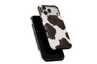 Side view of Cowhide phone case showing button cut-outs
