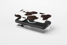 Side view of Cowhide case showing cow print design
