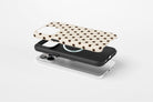Side view of Cream Spot phone case showing cream and chocolate brown polka dot print