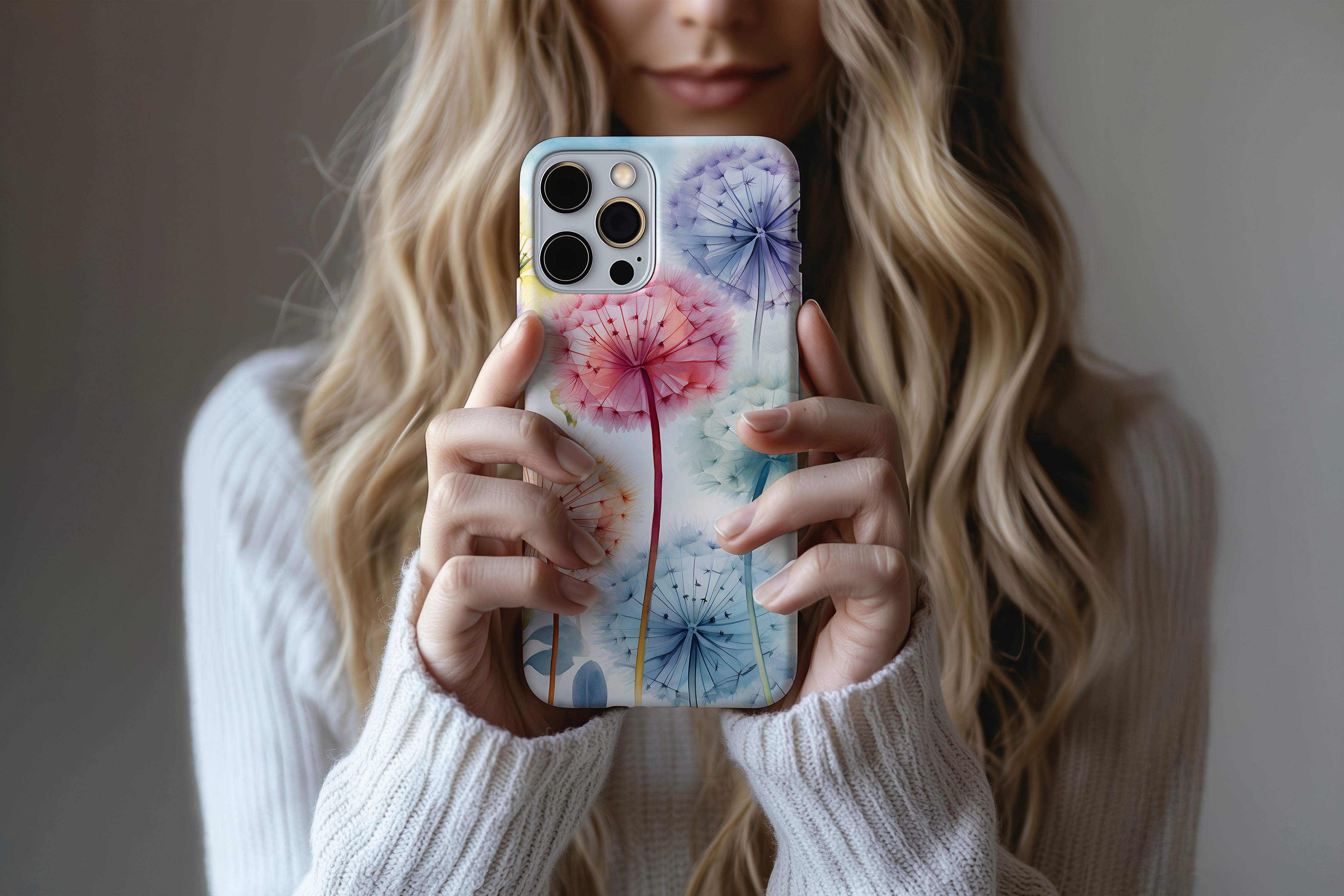 Lifestyle image of Dandelion dream phone case showing  floral design 