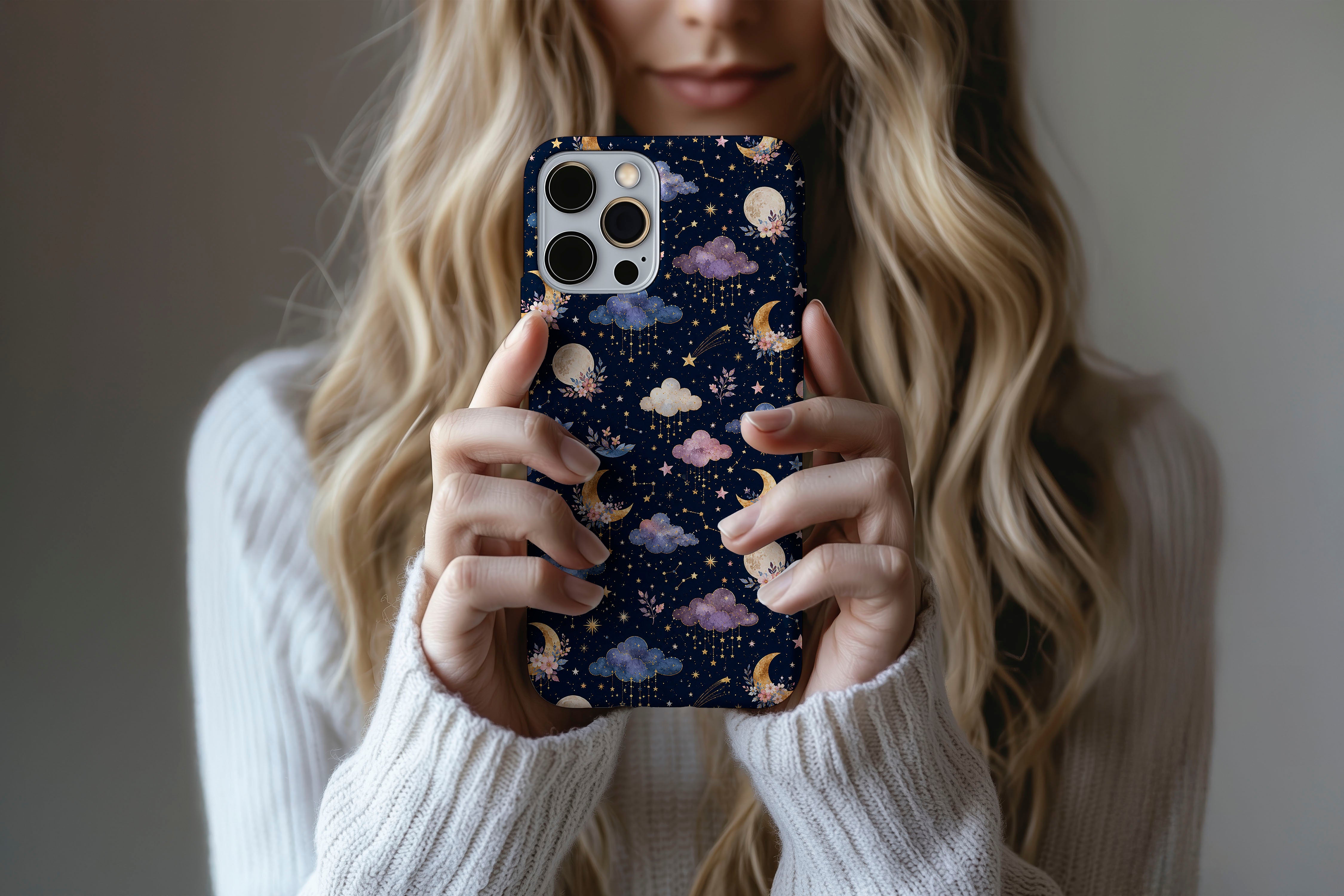 Lifestyle image of Dreamscape phone case showing celestial print design