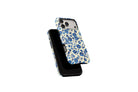 Side view of Floral Blues phone case showing button cut-outs