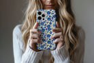 Lifestyle image of Floral Blues phone case showing blue floral design 
