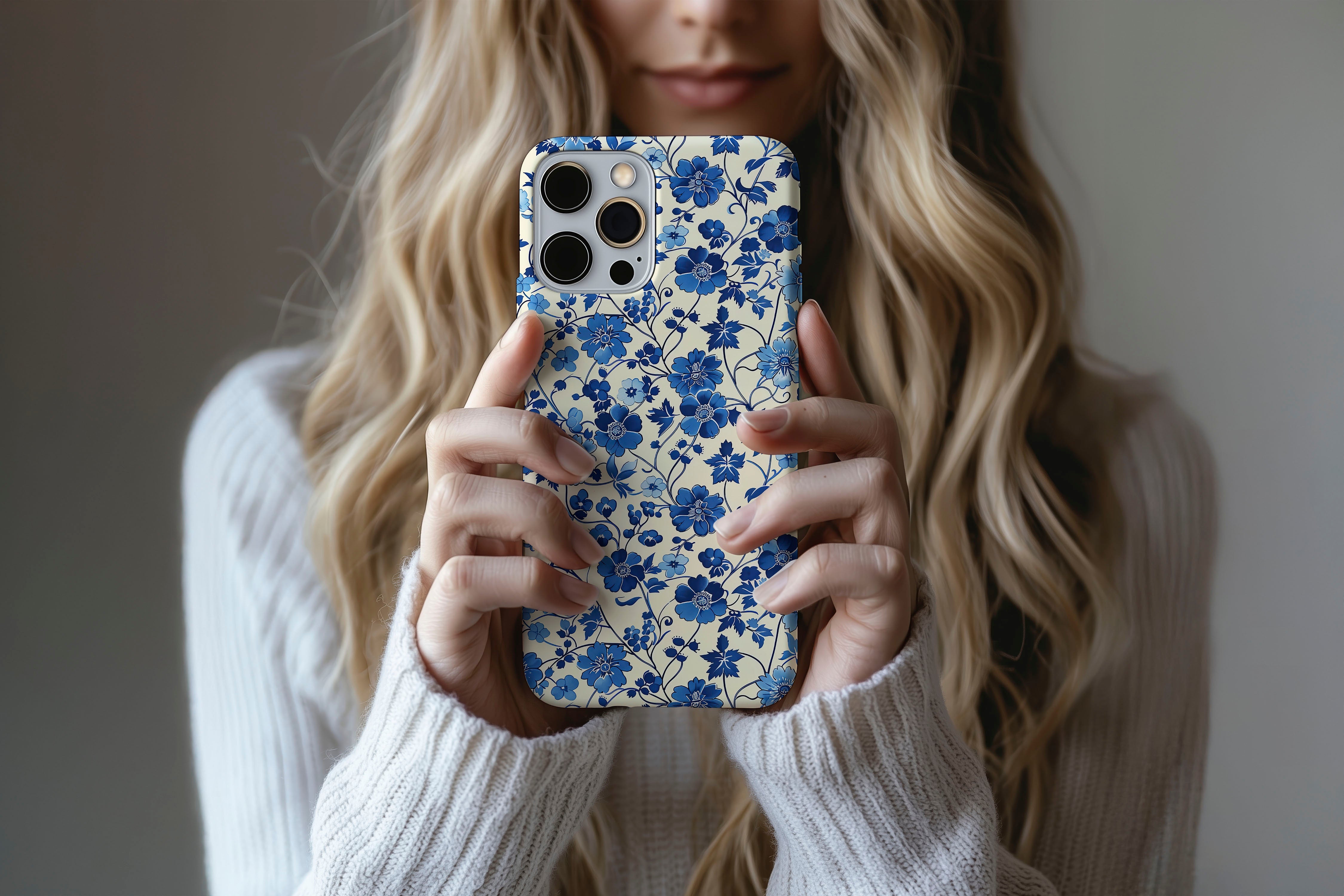 Lifestyle image of Floral Blues phone case showing blue floral design 