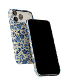 Side view of Floral Blues phone case showing button cut-outs
