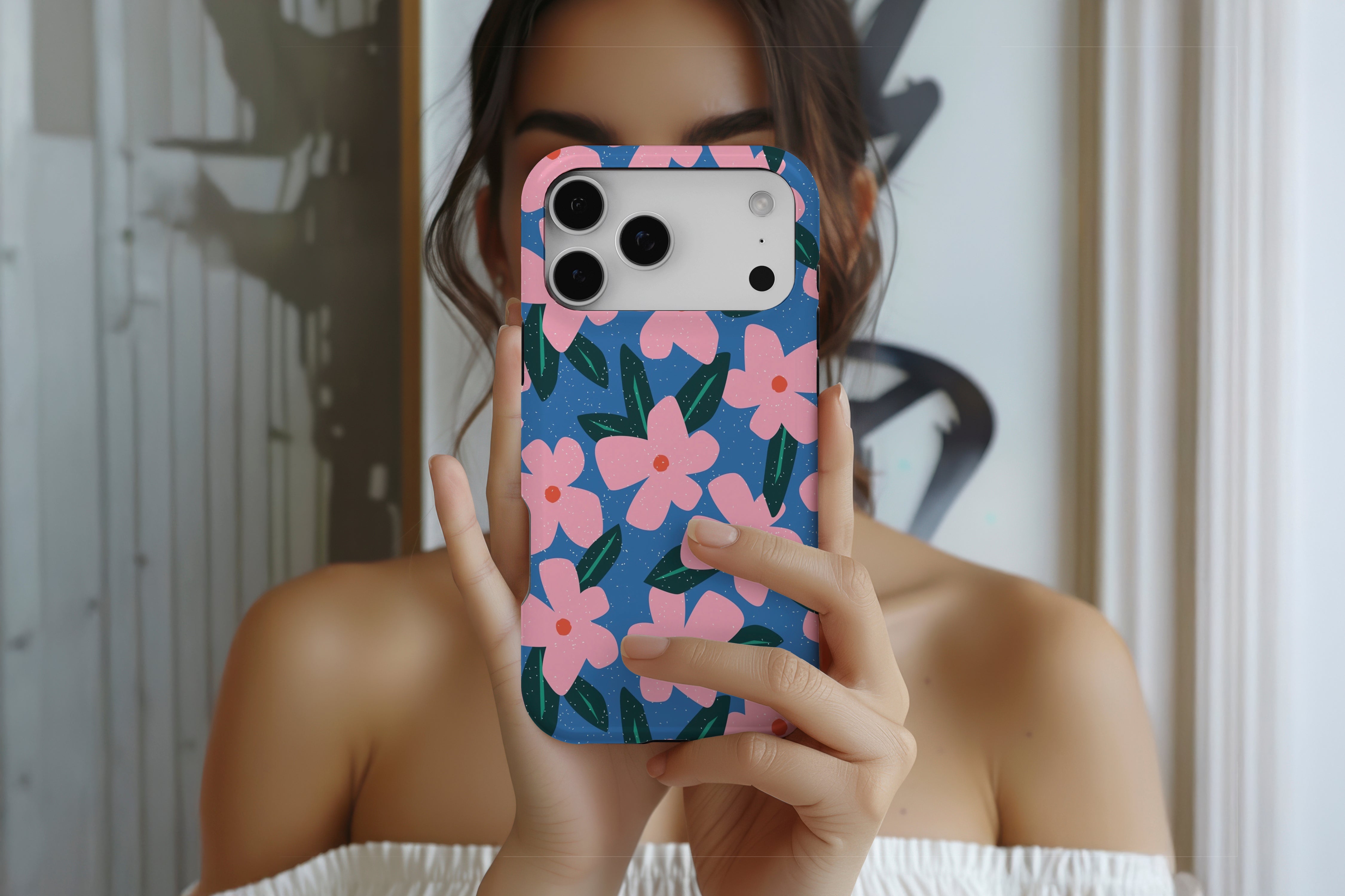Lifestyle image of Flower Bomb Blue magnetic tough case showing blue floral design 