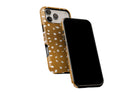 Side view of Freckled phone case showing button cut-outs