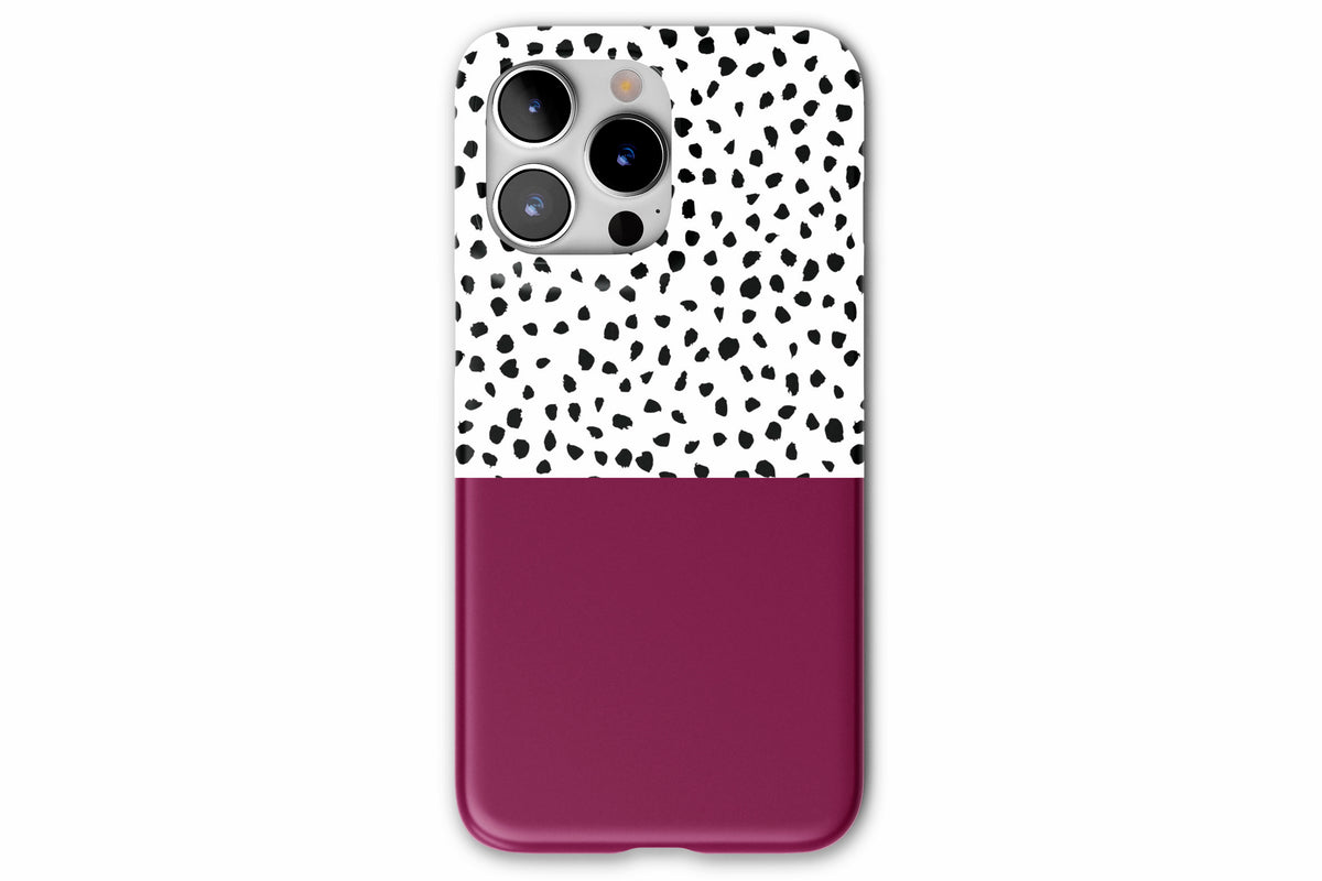Front view of Geo Dots (Burgundy) phone case showing black and white irregular dot print with burgundy colour block