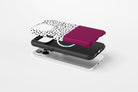 Side view of Geo Dots (Burgundy) phone case showing black and white irregular dot print with burgundy colour block