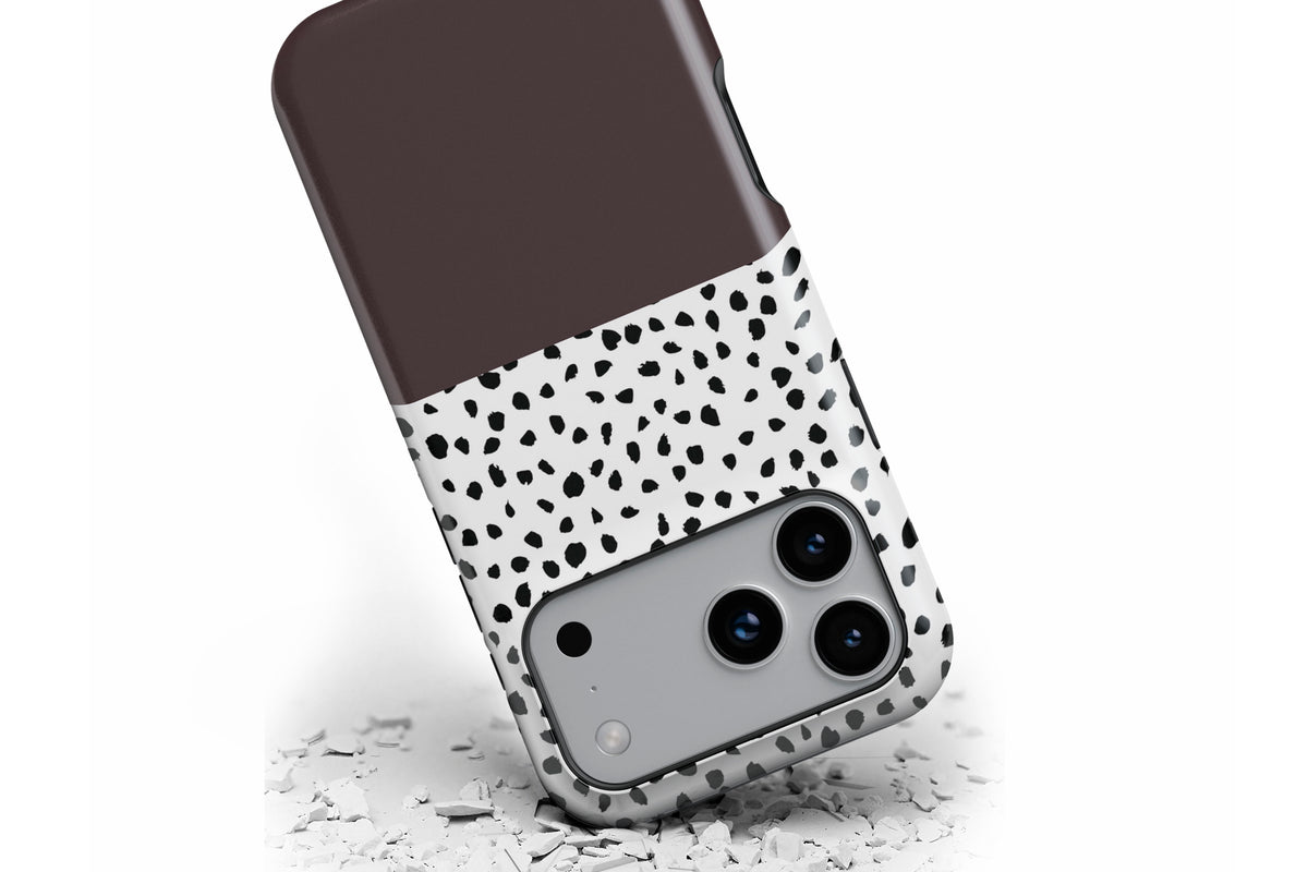 Front view of Geo Dots (Espresso) MagTough phone case showing black and white irregular dot print with espresso brown colour block