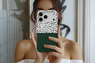 Lifestyle image of Geo Dots (Green) magnetic tough case showing geometric dots print design
