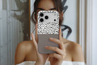Lifestyle image of Geo Dots (Latte) magnetic tough case showing geometric dots print design
