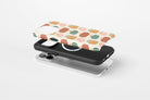 Side view of Harvest Pop case showing pumpkin print design