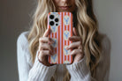 Lifestyle image of Lobster phone case showing lobsters print design