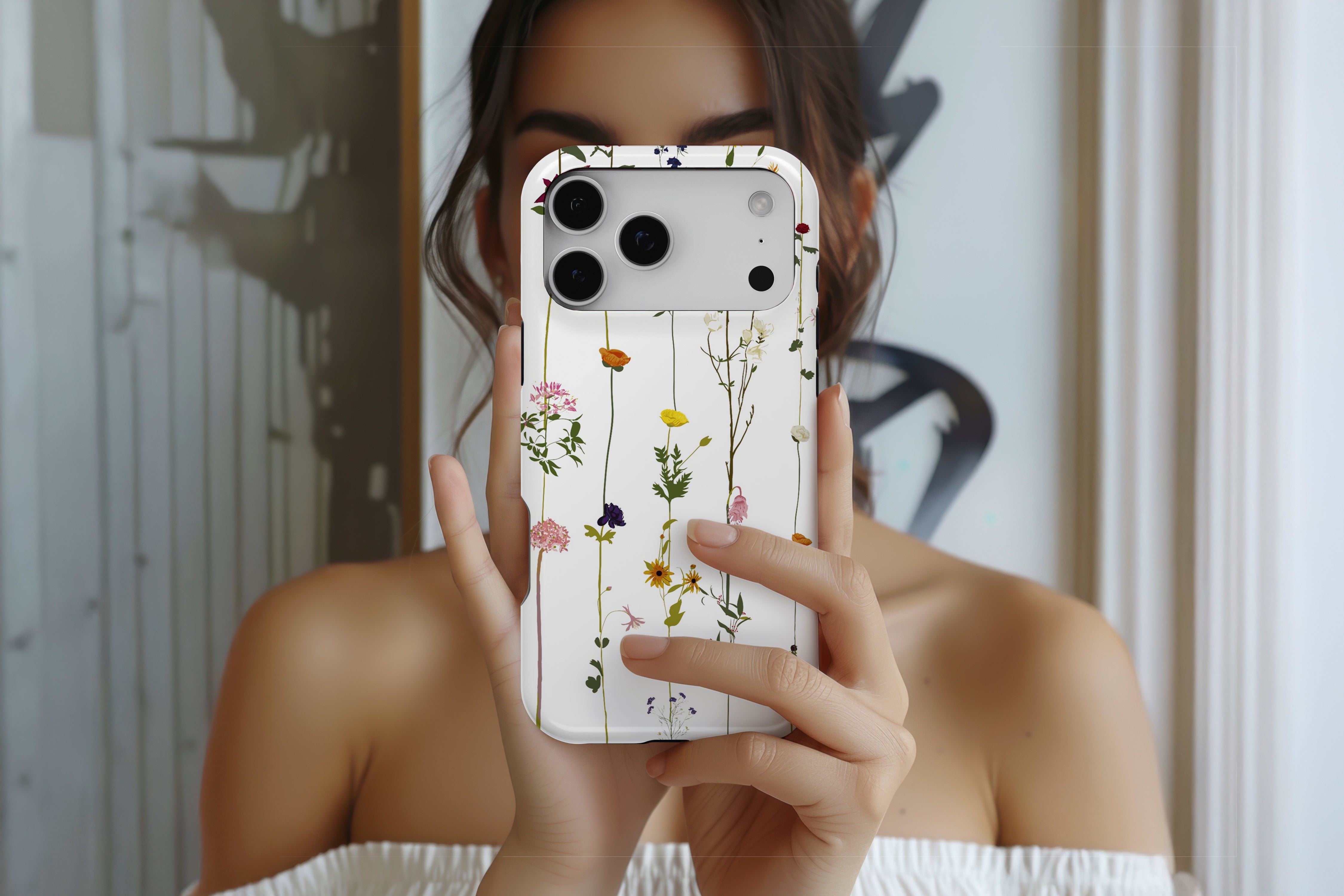 Lifestyle image of Flower Print magnetic tough case showing pastel floral design 