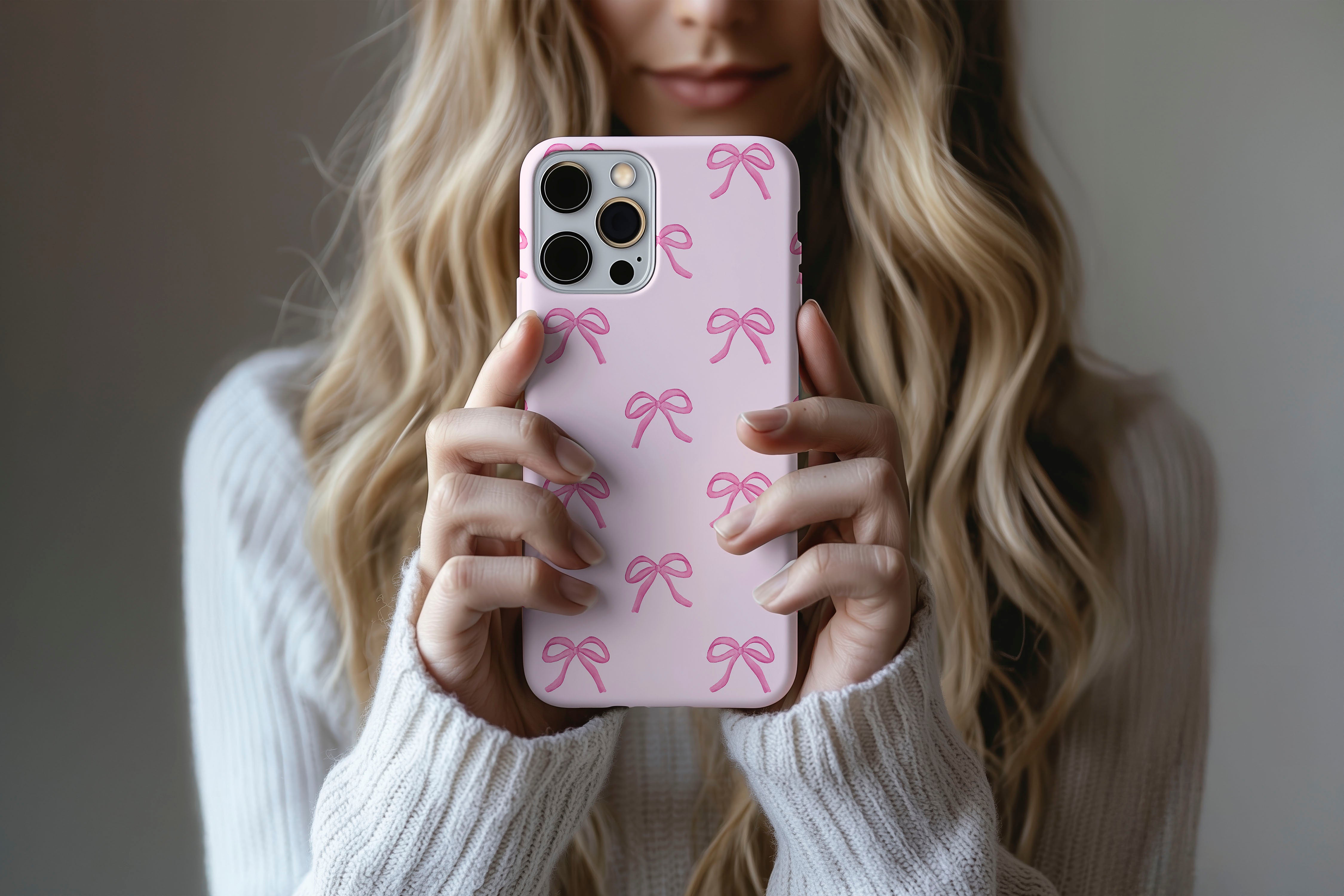 Lifestyle image of Pink Bows phone case showing pink bows design 