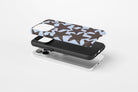 Lifestyle image of Stars (Chocolate) magnetic tough case showing star print design