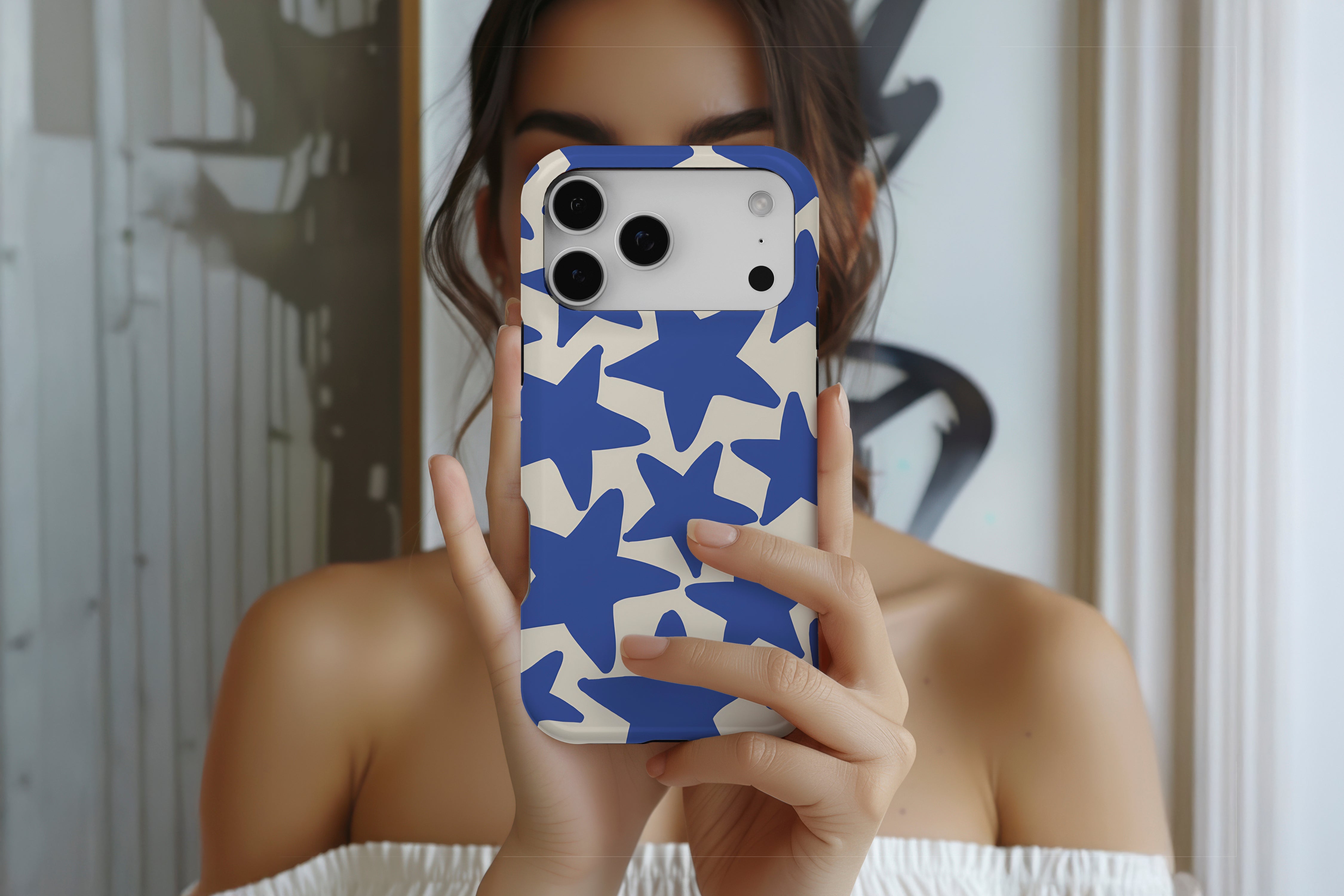 Lifestyle image of Stars Cobalt magnetic tough case showing stars design 