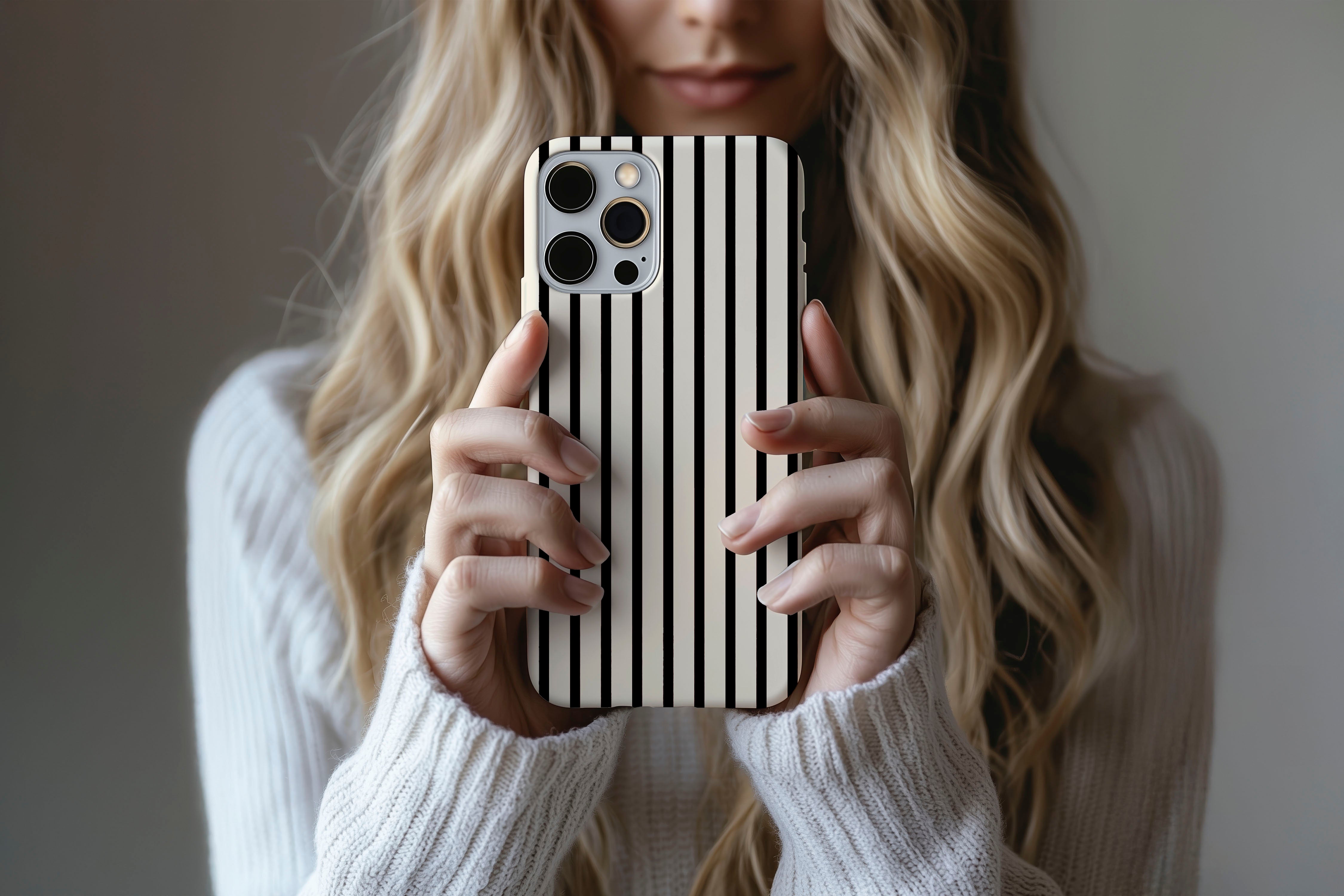Lifestyle image of Stripes Black phone case showing stipes design 