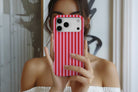 Lifestyle image of Stripes Cherry magnetic tough case showing stripes design