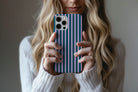 Lifestyle image of Stripes (Ivy) phone case showing stripe print design
