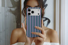 Lifestyle image of Stripes (Ivy) magnetic tough case showing stripe print design
