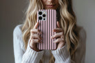 Lifestyle image of Stripes (Neapolitan) phone case showing stripe print design