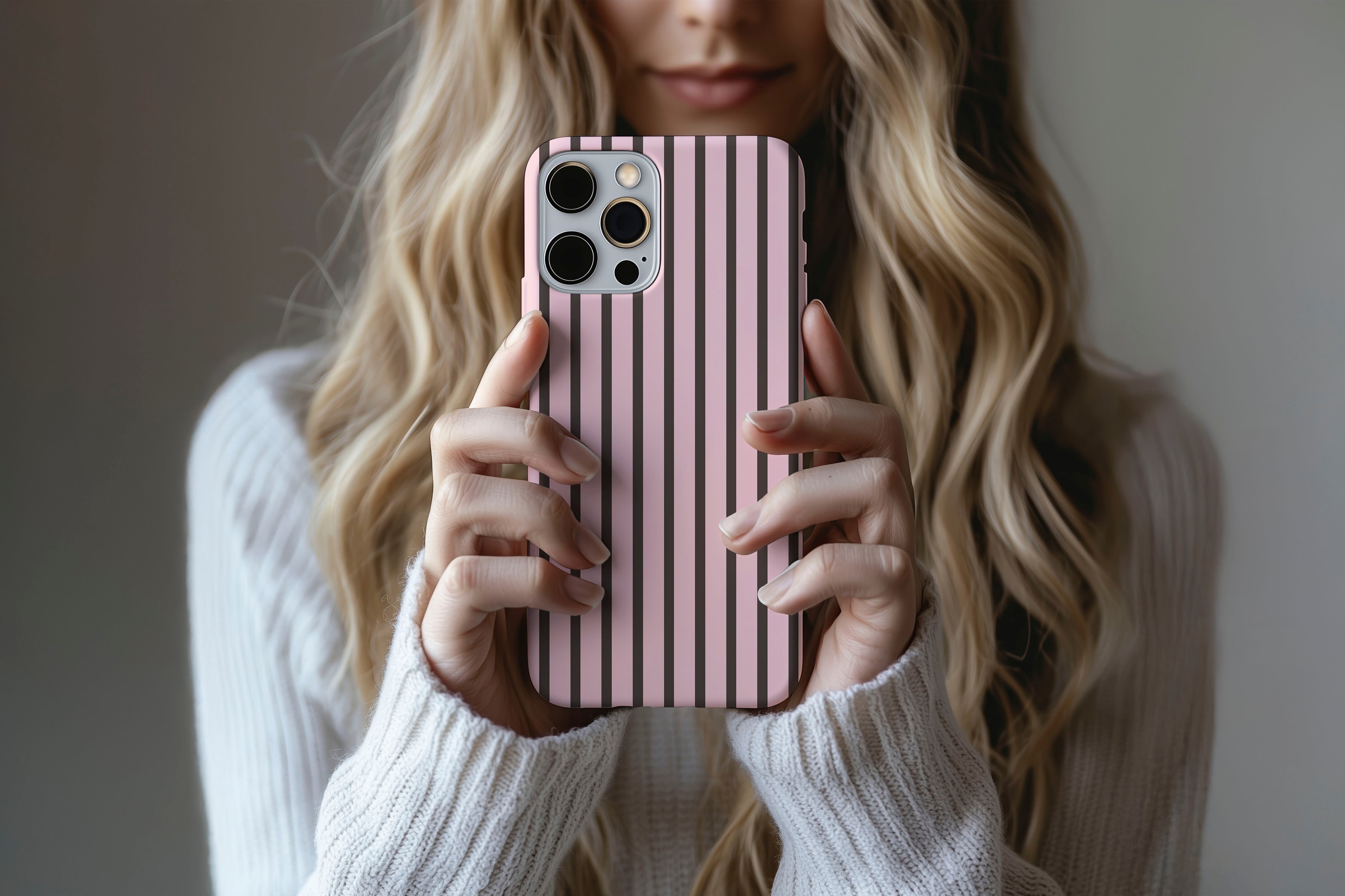 Lifestyle image of Stripes (Neapolitan) phone case showing stripe print design