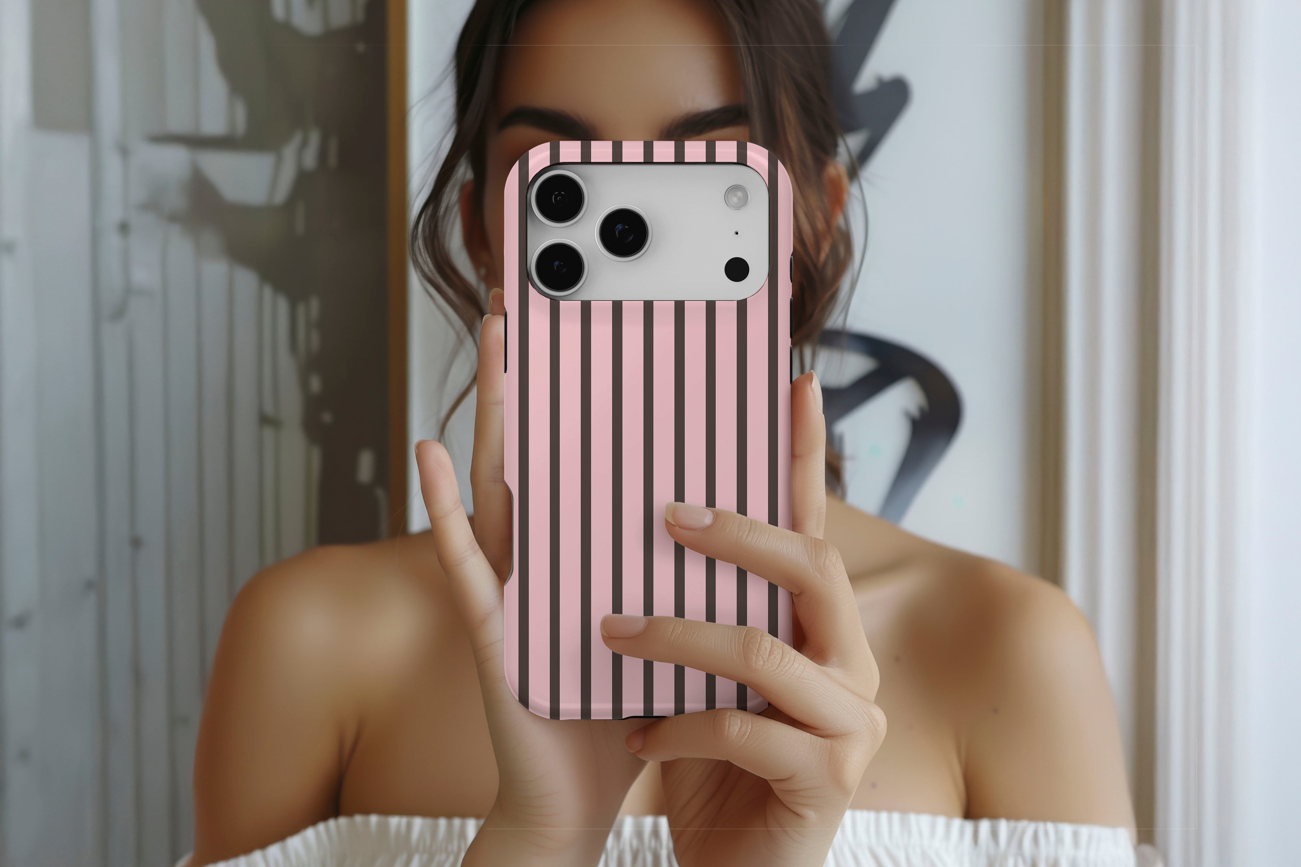 Lifestyle image of Stripes (Neapolitan) magnetic tough case showing stripe print design
