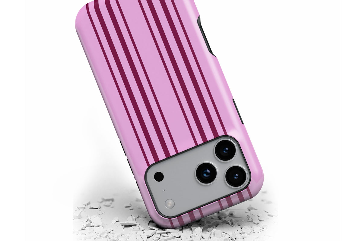 Front view of Sunday Club MagTough phone case showing pink and burgundy vertical stripe print