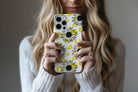 Lifestyle image of Sunflowers phone case showing floral print design