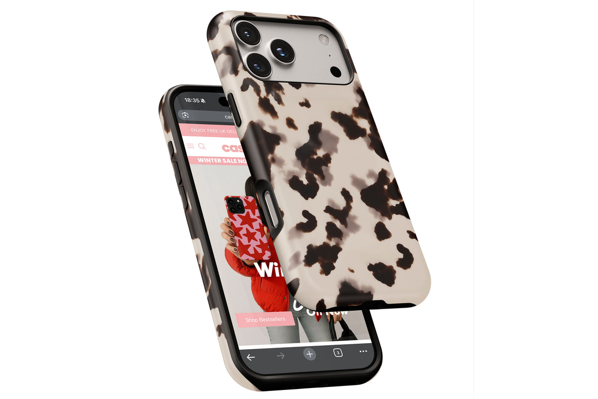 Side view of Vanilla Shell MagTough phone case showing button cut-outs